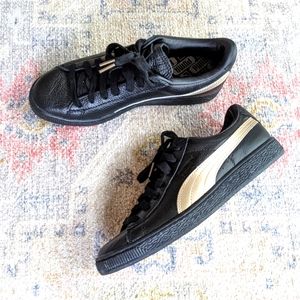 Puma sneakers black leather and gold 6.5 men's / 8.5 women's